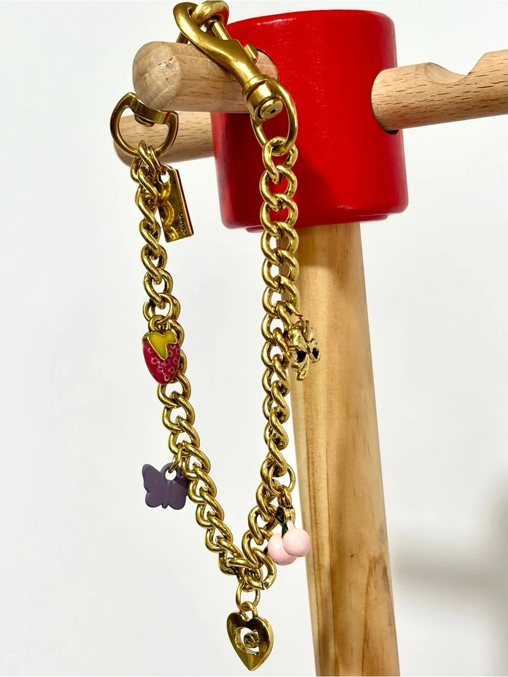 Charming Gold-Tone Swag Bag Chain with Pink Cherry and Multicolor Charms